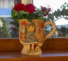 Девочка в гранатовом саду с медвежонком кашпо